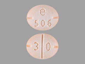 orange oval pill e 506.